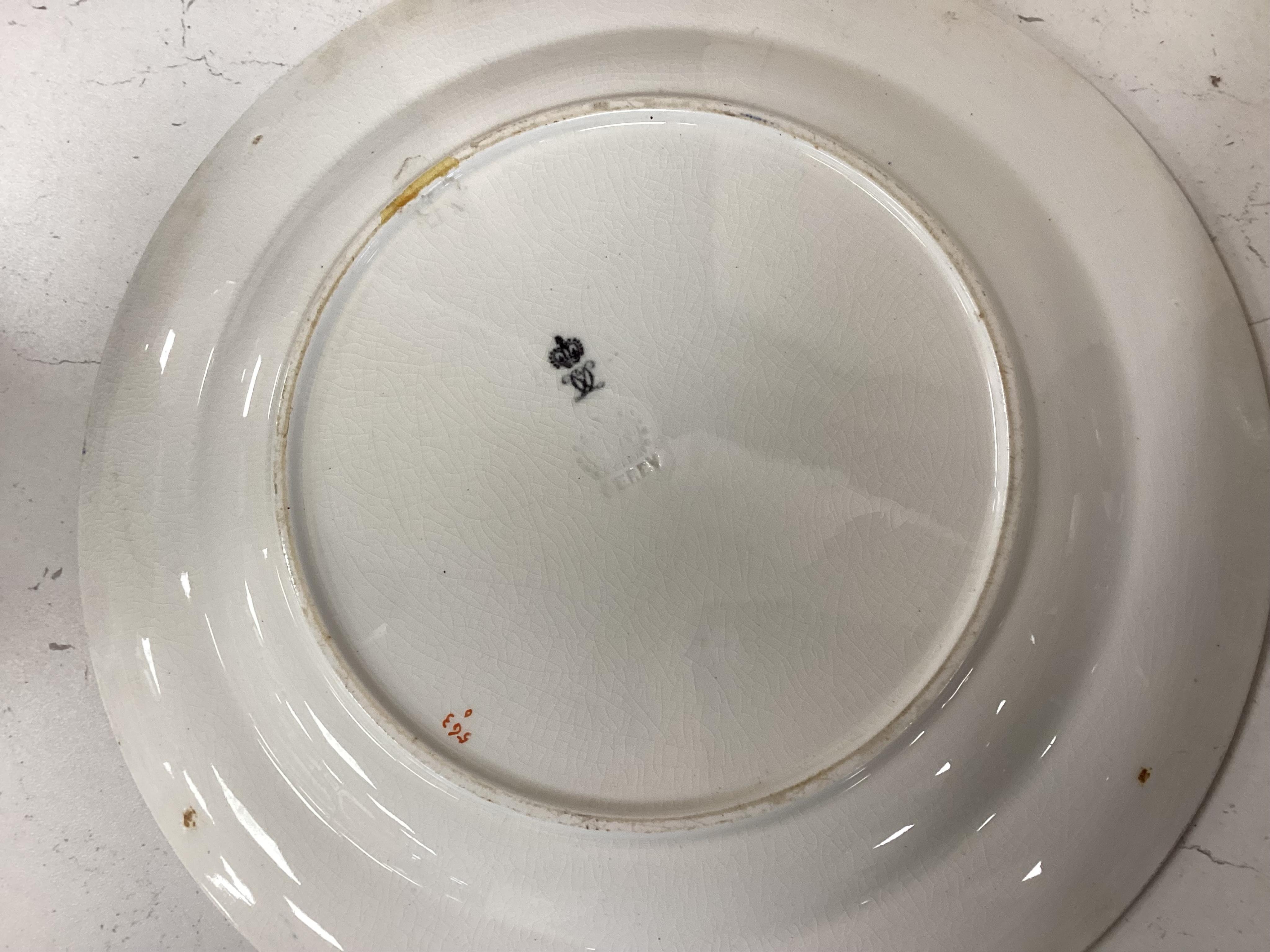 A quantity of Royal Crown Derby Imari to include a sandwich plate, cups and saucers and and miniature twin handled cups, largest 27cm in diameter